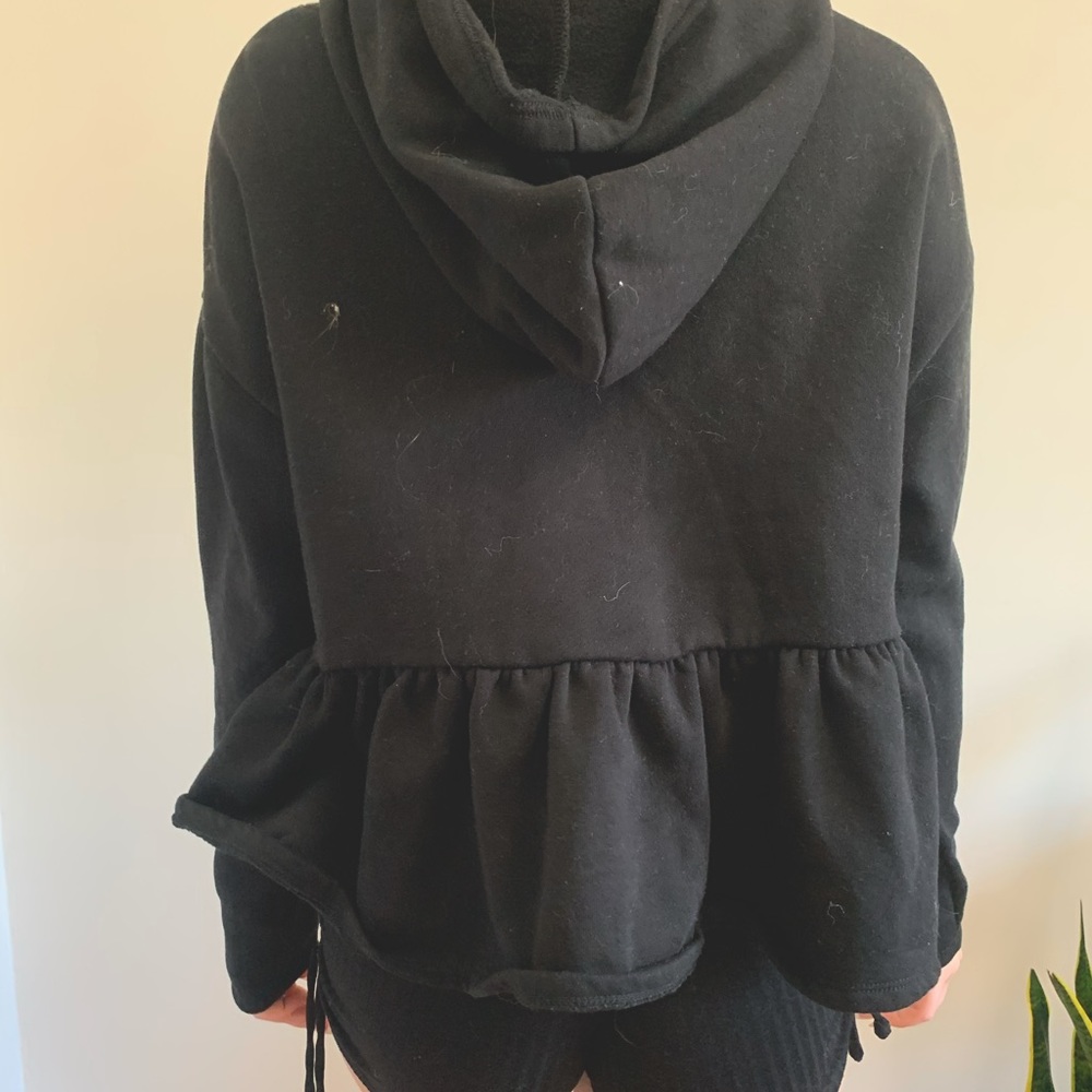 Black long sleeve the top with hood and flared end
